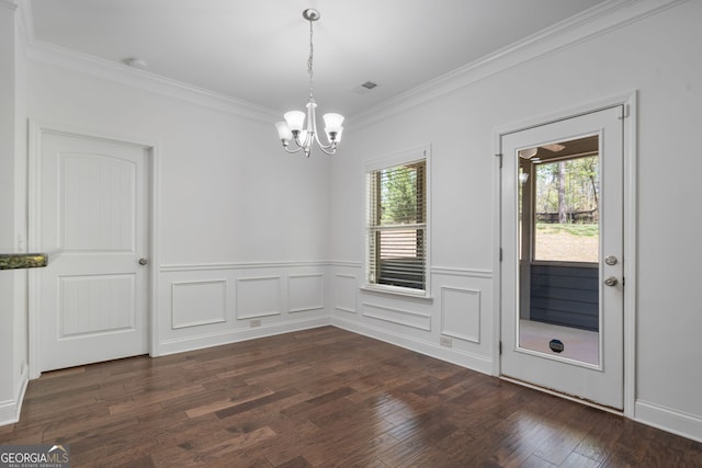 328 Spence Cir, Ball Ground, GA 30107 - unfurnished dining area with a chandelier, ornamental molding, dark wood finished floors, and a wainscoted wall
