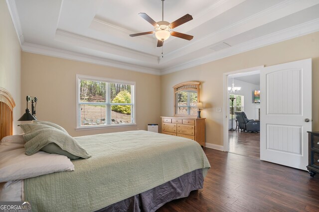 328 Spence Cir, Ball Ground, GA 30107 - bedroom with dark wood finished floors, crown molding, a chandelier, a tray ceiling, and a ceiling fan