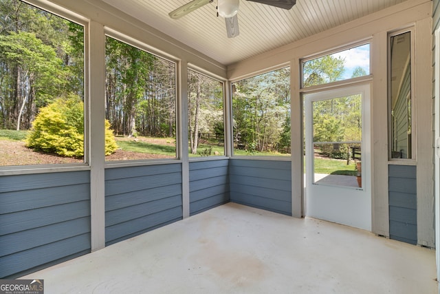 328 Spence Cir, Ball Ground, GA 30107 - unfurnished sunroom featuring a ceiling fan