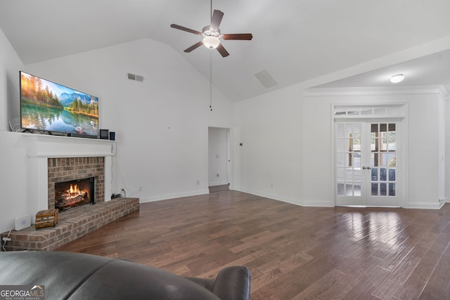 328 Spence Cir, Ball Ground, GA 30107 - living room featuring a ceiling fan, wood finished floors, a brick fireplace, french doors, and high vaulted ceiling