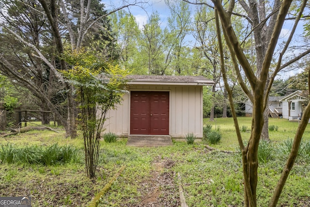 view of outbuilding featuring an outdoor structure
