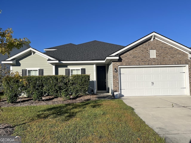 155 Martello Rd, Pooler, GA 31322 - single story home featuring roof with shingles, a front yard, brick siding, an attached garage, and driveway