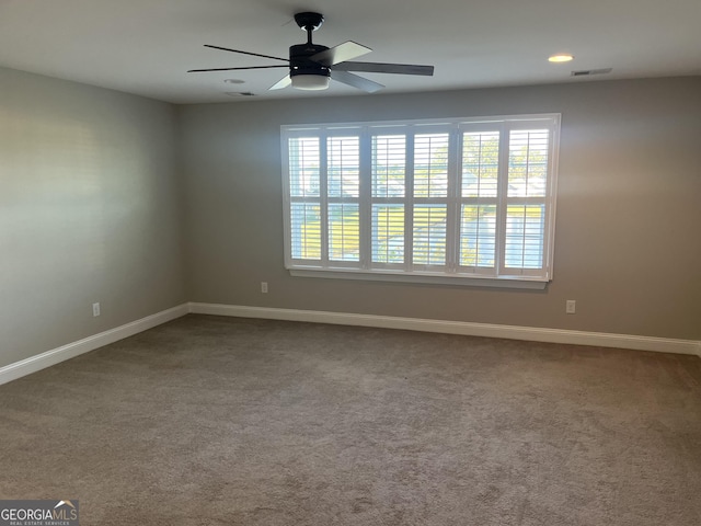 155 Martello Rd, Pooler, GA 31322 - spare room featuring visible vents, baseboards, a ceiling fan, and carpet flooring