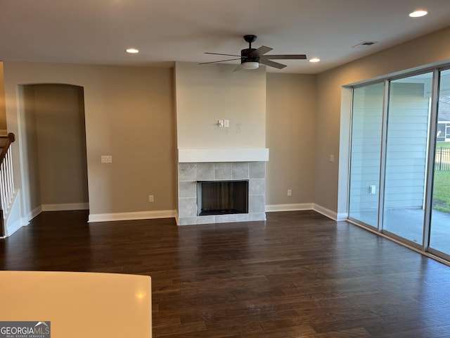 155 Martello Rd, Pooler, GA 31322 - unfurnished living room featuring dark wood-style flooring, a ceiling fan, and a wealth of natural light
