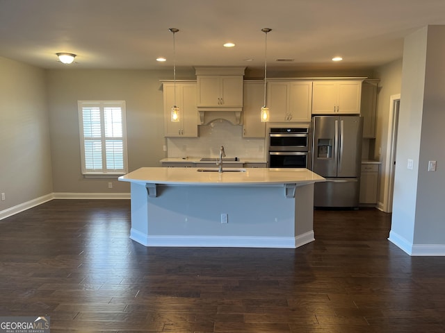 155 Martello Rd, Pooler, GA 31322 - kitchen with custom exhaust hood, dark wood-style flooring, light countertops, appliances with stainless steel finishes, and a sink