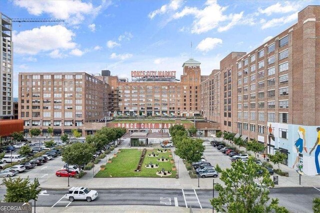 873 Monroe Cir NE, Atlanta, GA 30308 - view of building exterior with a view of city