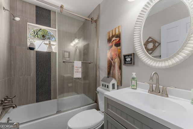 503 Duke Dr, Marietta, GA 30066 - full bathroom featuring enclosed tub / shower combo, vanity, and toilet
