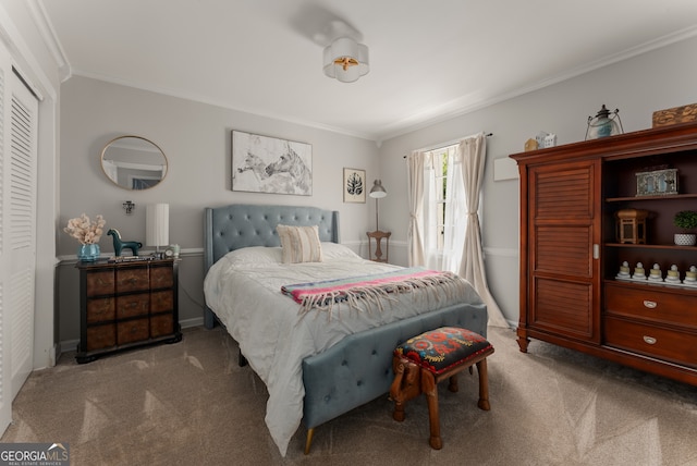 503 Duke Dr, Marietta, GA 30066 - bedroom with a closet, baseboards, ornamental molding, and carpet floors