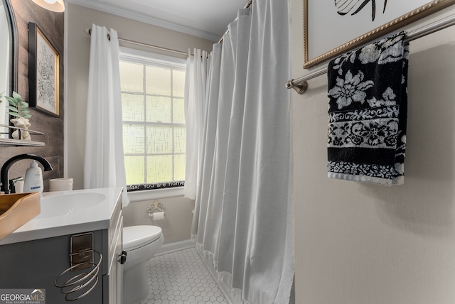 503 Duke Dr, Marietta, GA 30066 - bathroom with vanity, baseboards, ornamental molding, tile patterned floors, and toilet