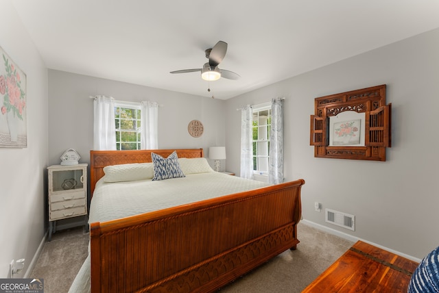503 Duke Dr, Marietta, GA 30066 - bedroom with visible vents, baseboards, ceiling fan, and carpet floors