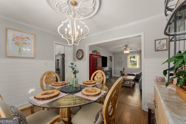 503 Duke Dr, Marietta, GA 30066 - dining space with dark wood-type flooring, crown molding, and ceiling fan with notable chandelier