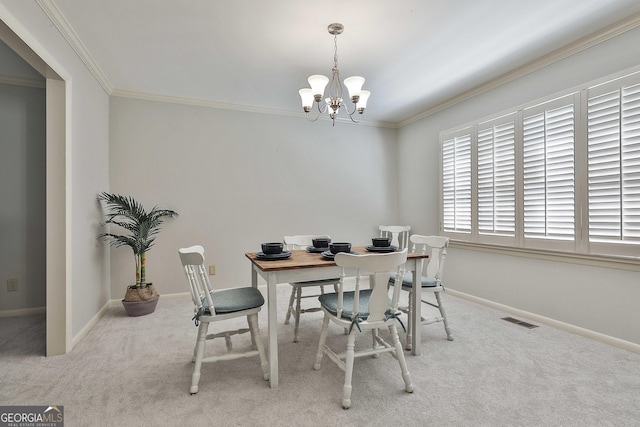 31 Festiva Dr, Newnan, GA 30263 - carpeted dining area featuring visible vents, baseboards, and ornamental molding