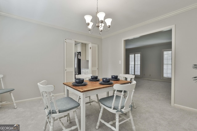 31 Festiva Dr, Newnan, GA 30263 - dining room featuring crown molding, light colored carpet, a notable chandelier, and baseboards