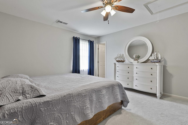 31 Festiva Dr, Newnan, GA 30263 - bedroom with baseboards, attic access, carpet floors, visible vents, and ceiling fan