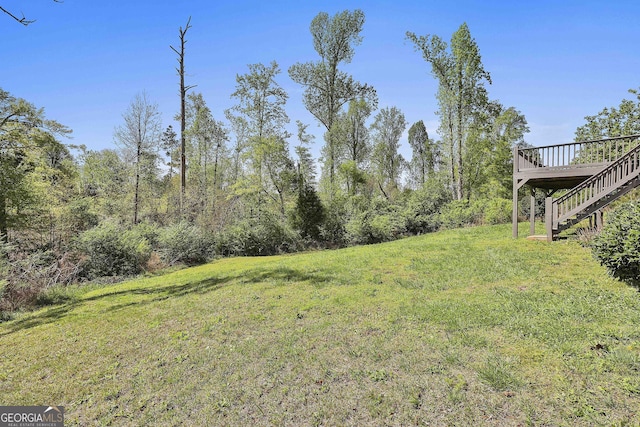 31 Festiva Dr, Newnan, GA 30263 - view of yard featuring stairway and a deck