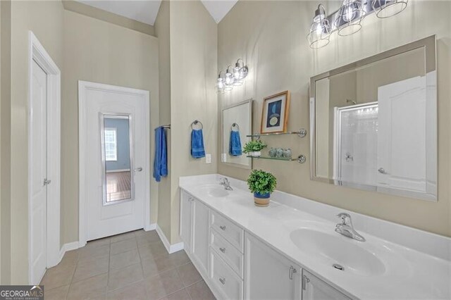 206 Glens Loop, Woodstock, GA 30188 - full bath with tile patterned floors, double vanity, and a shower