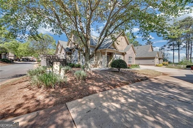 206 Glens Loop, Woodstock, GA 30188 - view of front facade featuring concrete driveway and an attached garage