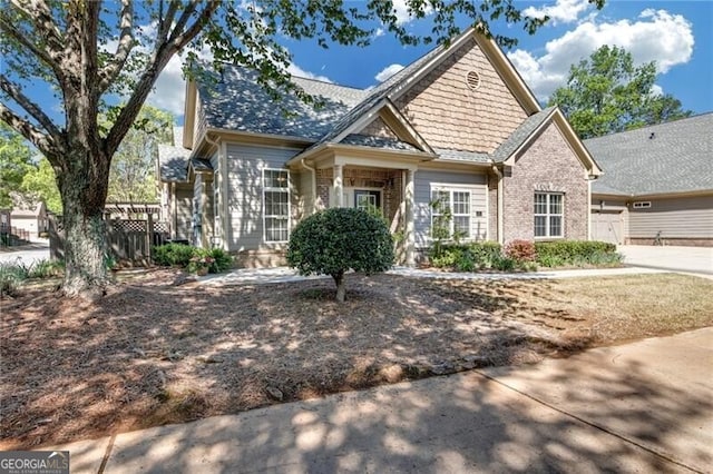206 Glens Loop, Woodstock, GA 30188 - craftsman house featuring concrete driveway, brick siding, and a garage