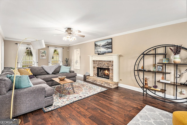 60 Bartlett Way, Dallas, GA 30157 - living room featuring crown molding, ceiling fan, wood finished floors, baseboards, and a stone fireplace
