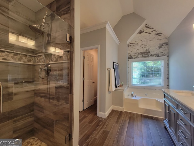60 Bartlett Way, Dallas, GA 30157 - bathroom featuring a stall shower, wood tiled floors, a bath, baseboards, and vaulted ceiling