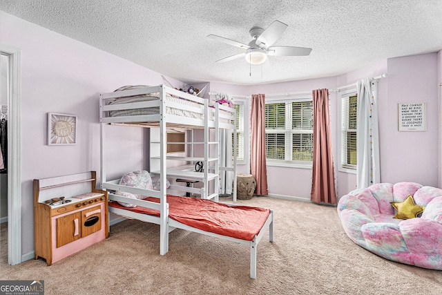 60 Bartlett Way, Dallas, GA 30157 - bedroom with carpet flooring, a textured ceiling, baseboards, and ceiling fan