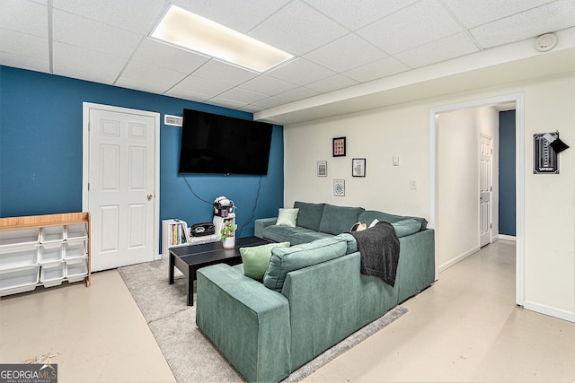 60 Bartlett Way, Dallas, GA 30157 - living area featuring a drop ceiling, finished concrete flooring, and baseboards