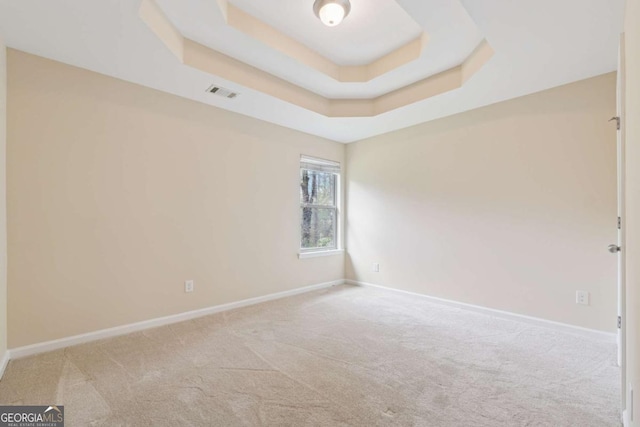 3892 Trillium Wood Trl, Snellville, GA 30039 - carpeted spare room with a raised ceiling