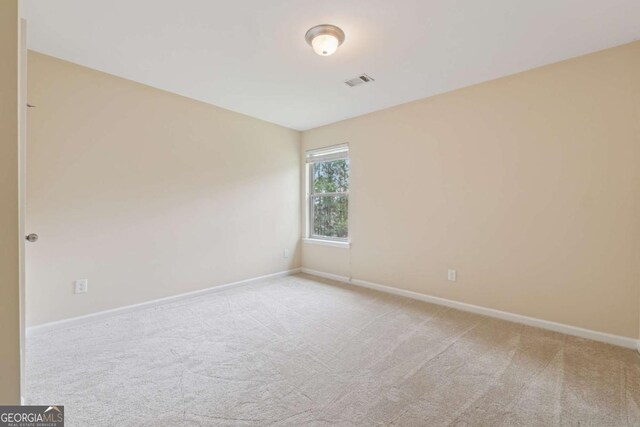 3892 Trillium Wood Trl, Snellville, GA 30039 - spare room with light carpet