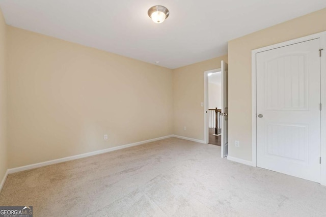 3892 Trillium Wood Trl, Snellville, GA 30039 - unfurnished bedroom featuring light colored carpet