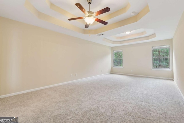 3892 Trillium Wood Trl, Snellville, GA 30039 - carpeted spare room featuring a raised ceiling, a smoke detector, and ceiling fan