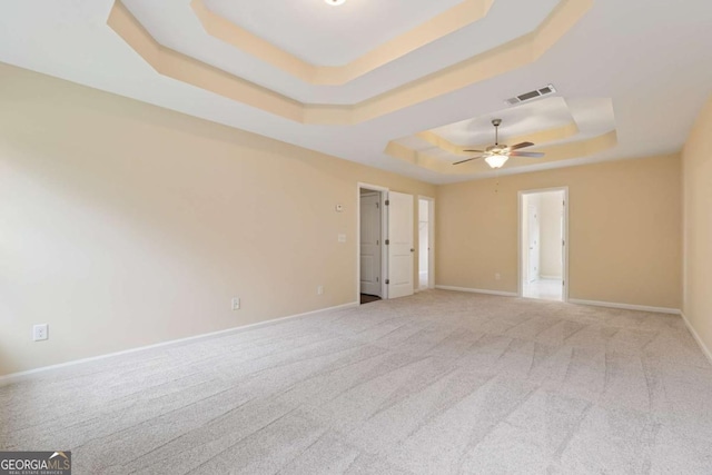 3892 Trillium Wood Trl, Snellville, GA 30039 - unfurnished room featuring a raised ceiling, carpet flooring, and ceiling fan