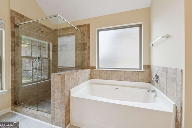 3892 Trillium Wood Trl, Snellville, GA 30039 - full bathroom with a bath and a shower stall