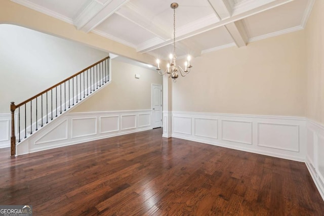 3892 Trillium Wood Trl, Snellville, GA 30039 - unfurnished dining area featuring beamed ceiling, stairway, a chandelier, wood finished floors, and coffered ceiling
