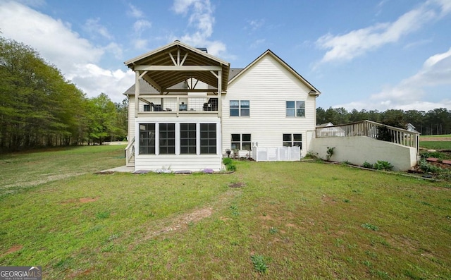 393 Old Good Hope Rd, Good Hope, GA 30641 - back of house featuring a balcony and a lawn