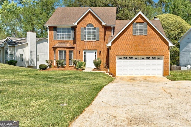 3612 River Mill Ct, Ellenwood, GA 30294 - colonial inspired home with concrete driveway, a front yard, and brick siding