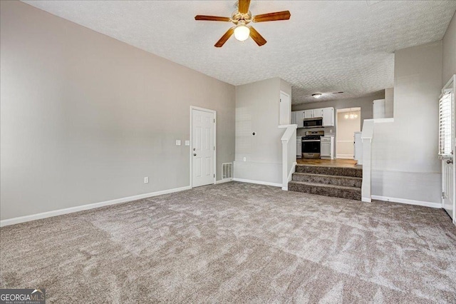 3612 River Mill Ct, Ellenwood, GA 30294 - unfurnished living room featuring visible vents, a ceiling fan, carpet, a textured ceiling, and stairs