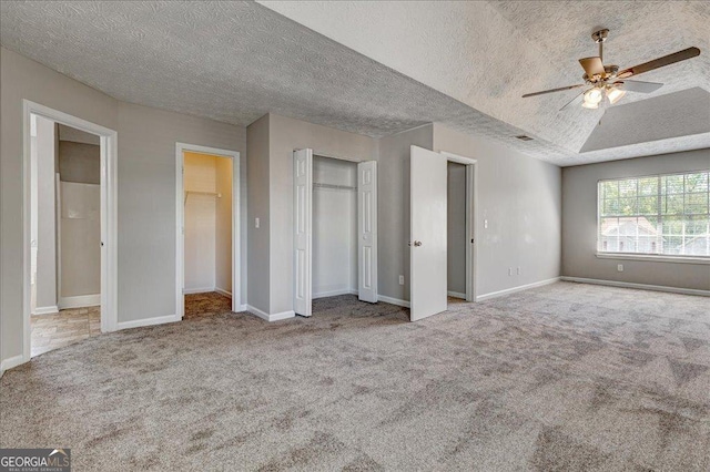 3612 River Mill Ct, Ellenwood, GA 30294 - unfurnished bedroom with baseboards, a textured ceiling, and carpet floors