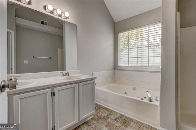 3612 River Mill Ct, Ellenwood, GA 30294 - full bathroom with a jetted tub, double vanity, a sink, and visible vents