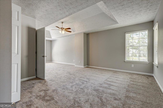 3612 River Mill Ct, Ellenwood, GA 30294 - carpeted empty room with baseboards, a textured ceiling, and ceiling fan