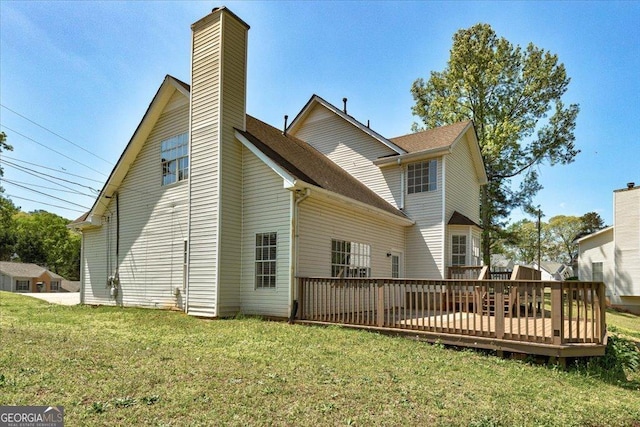 3612 River Mill Ct, Ellenwood, GA 30294 - back of house featuring a deck, a chimney, and a lawn