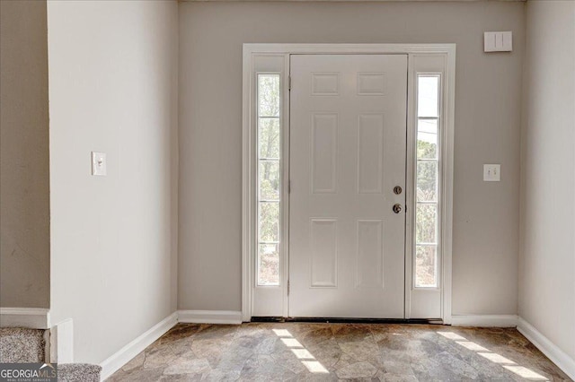 3612 River Mill Ct, Ellenwood, GA 30294 - entrance foyer with baseboards and stone finish floor