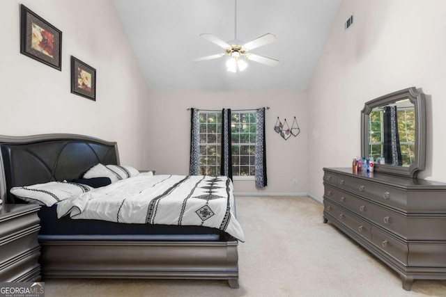 bedroom with baseboards, a ceiling fan, visible vents, high vaulted ceiling, and carpet