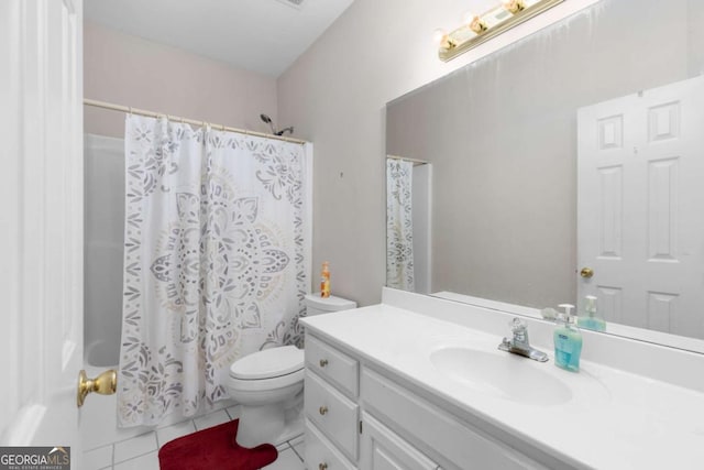 bathroom featuring toilet, tile patterned floors, vanity, and shower / bath combination with curtain