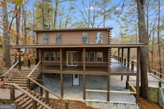 155 Indian Bend Dr, Lagrange, GA 30240 - rear view of property with a patio area, stairway, a deck, and log siding