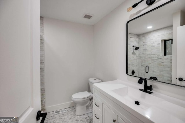 155 Indian Bend Dr, Lagrange, GA 30240 - bathroom featuring vanity, visible vents, toilet, a stall shower, and baseboards