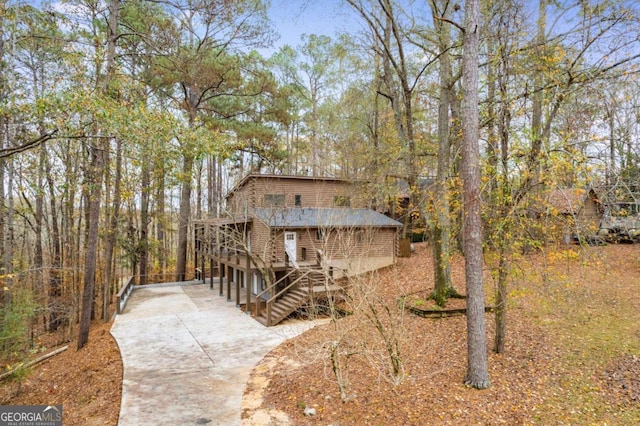 155 Indian Bend Dr, Lagrange, GA 30240 - chalet / cabin with stairs and driveway