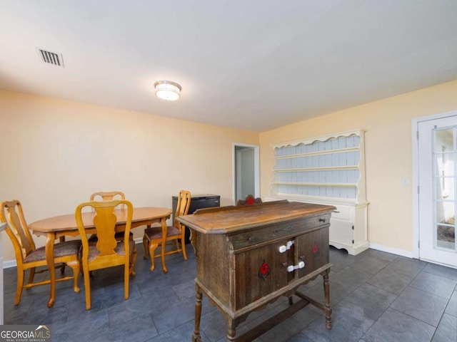 244 Sherwood Ln, Brunswick, GA 31525 - dining space with baseboards