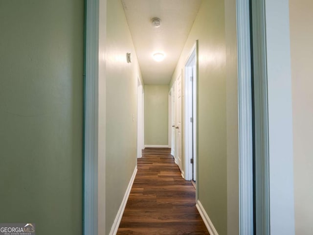 244 Sherwood Ln, Brunswick, GA 31525 - corridor featuring dark wood-type flooring and baseboards