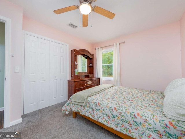 244 Sherwood Ln, Brunswick, GA 31525 - bedroom with carpet, a closet, and ceiling fan