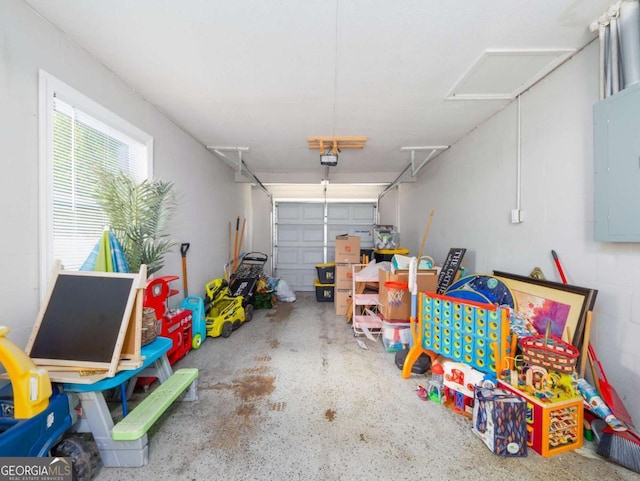 244 Sherwood Ln, Brunswick, GA 31525 - garage featuring electric panel and a garage door opener